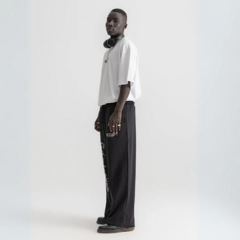 Unisex white box-fit tee in heavyweight Egyptian cotton with bold grungy BTO logo on chest.