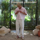 Unisex button-up shirt with a boxy fit and midi crop, featuring sailor stripes in rose pink and white. Embroidered "Humble State of Mind" logo in burgundy red on the back and "Originals" embroidery on the front. Made from 100% thick cotton for a relaxed, summery style.