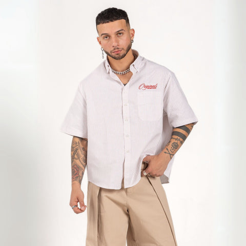 Unisex button-up shirt with a boxy fit and midi crop, featuring sailor stripes in sand beige and white. Embroidered "Humble State of Mind" logo in burgundy red on the back and "Originals" embroidery on the front. Made from 100% thick cotton for a relaxed, summery style.