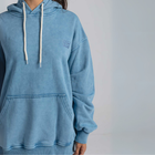 Model wearing the BROWNTOAST ASSID Hoodie in denim blue — unisex cotton-blend hoodie with relaxed fit and unique dye variations acid washed/stone washed. Each piece from the ASSID drop is one of a kind, made in Egypt through a special process for an elevated everyday look.