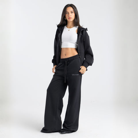 Model wearing the BROWNTOAST Core Full Zip Up Jacket from the Core Drop — a relaxed unisex hoodie with a dual zipper and adjustable hood. Made in Egypt from soft cotton, combining everyday comfort with effortless street style.