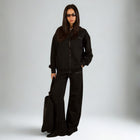 Model wearing the BROWNTOAST Core Full Zip Up Jacket from the Core Drop — a relaxed unisex hoodie with a dual zipper and adjustable hood. Made in Egypt from soft cotton, combining everyday comfort with effortless street style.