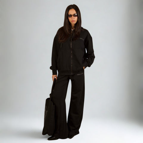 Model wearing the BROWNTOAST Core Full Zip Up Jacket from the Core Drop — a relaxed unisex hoodie with a dual zipper and adjustable hood. Made in Egypt from soft cotton, combining everyday comfort with effortless street style.