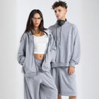 Model wearing the BROWNTOAST Core Full Zip Up Jacket from the Core Drop — a relaxed unisex hoodie with a dual zipper and adjustable hood. Made in Egypt from soft cotton, combining everyday comfort with effortless street style.