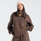 Core Quarter Zip Up sweatshirt in brown, front view showcasing relaxed boxy fit and minimal design.