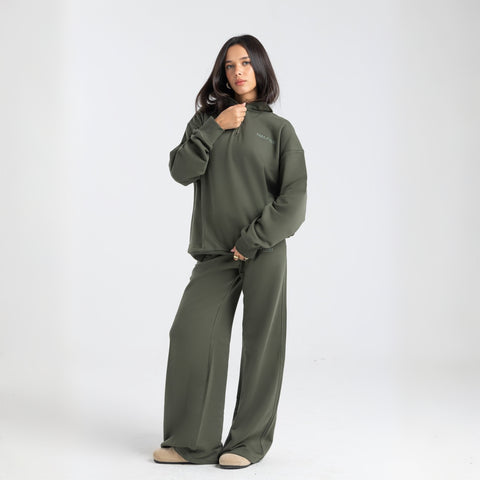 Core Quarter Zip Up sweatshirt in olive, front view showcasing relaxed boxy fit and minimal design.