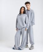 Core Quarter Zip Up sweatshirt in light grey, front view showcasing relaxed boxy fit and minimal design.