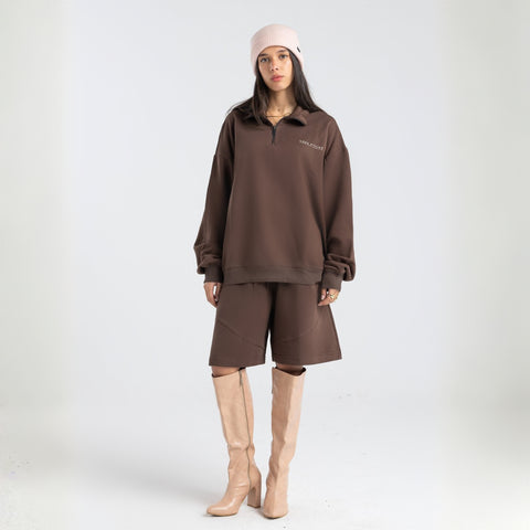 Core Quarter Zip Up sweatshirt in brown, front view showcasing relaxed boxy fit and minimal design.