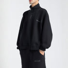 Core Quarter Zip Up sweatshirt in black, front view showcasing relaxed boxy fit and minimal design.