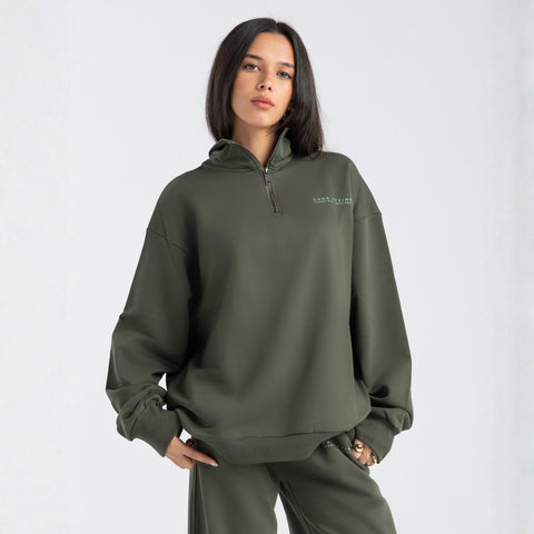 Core Quarter Zip Up sweatshirt in olive, front view showcasing relaxed boxy fit and minimal design.