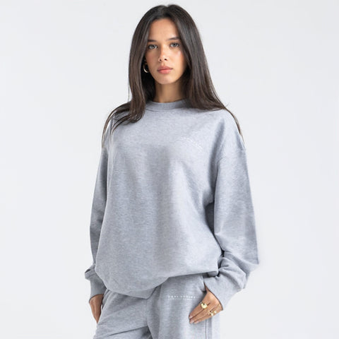 Model wearing the BROWNTOAST Core Crewneck from the Core Drop — a relaxed unisex sweatshirt with a classic crew neckline and front silk-screen print. Made in Egypt from a soft cotton-lycra blend for elevated everyday comfort and style.