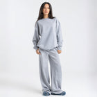 Model wearing the BROWNTOAST Core Crewneck from the Core Drop — a relaxed unisex sweatshirt with a classic crew neckline and front silk-screen print. Made in Egypt from a soft cotton-lycra blend for elevated everyday comfort and style.