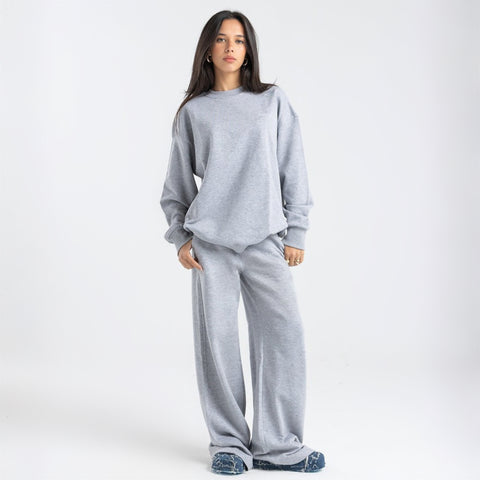 Model wearing the BROWNTOAST Core Crewneck from the Core Drop — a relaxed unisex sweatshirt with a classic crew neckline and front silk-screen print. Made in Egypt from a soft cotton-lycra blend for elevated everyday comfort and style.