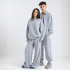 Model wearing the BROWNTOAST Core Crewneck from the Core Drop — a relaxed unisex sweatshirt with a classic crew neckline and front silk-screen print. Made in Egypt from a soft cotton-lycra blend for elevated everyday comfort and style.