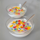 BROWNTOAST Cereal Candle — realistic handcrafted fruity-scented candle designed to look like a bowl of cereal. Comes in a reusable glass bowl with a metal spoon. Part of the Dopamine Decor lifestyle drop.