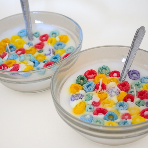 BROWNTOAST Cereal Candle — realistic handcrafted fruity-scented candle designed to look like a bowl of cereal. Comes in a reusable glass bowl with a metal spoon. Part of the Dopamine Decor lifestyle drop.