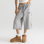 Unisex grey long shorts made of 100% cotton with raw hem edges and chunky waistband.