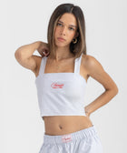 Striped Ocean Blue and White cropped cotton top with burgundy ‘Humble’ embroidery on front.