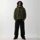 Model wearing the BROWNTOAST Anonymous Attire Polar Fleece Masked Hoodie — unisex fleece hoodie with full-zip masked hood, drop shoulders, patch detailing, and adjustable side clasps. Made in Egypt from 100% polar fleece for warmth and street-ready edge.