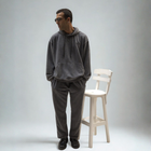 Model wearing the BROWNTOAST ASSID Men’s Straight-Leg Sweatpants from the ASSID Kollection — relaxed-fit cotton-blend sweatpants with straight-leg cut, adjustable waist, and unique dye variations. Made in Egypt for a timeless, effortless streetwear look.