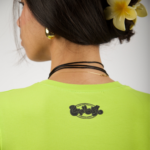 Sabah El Tofah Morning Market baby tee – in brat green with black silk-screen front print, BTX x Nada Sultan