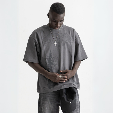 Unisex washed grey box-fit tee in heavyweight Egyptian cotton with skeletal spine and distorted ECHOES text on chest, abstract designs on back.