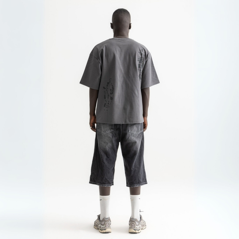 Unisex washed grey box-fit tee in heavyweight Egyptian cotton with skeletal spine and distorted ECHOES text on chest, abstract designs on back.