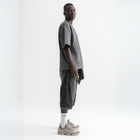 Unisex washed grey box-fit tee in heavyweight Egyptian cotton with skeletal spine and distorted ECHOES text on chest, abstract designs on back.