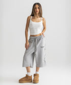 White ribbed spaghetti tank styled with denim jeans for a casual everyday outfit.