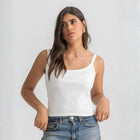 White ribbed spaghetti tank styled with denim jeans for a casual everyday outfit.