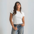 Women’s ribbed short sleeve top made from 95% cotton and 5% lycra. Features a fitted silhouette for a flattering, comfortable fit. Soft and breathable fabric with a versatile design for layering or wearing on its own.