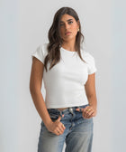 Women’s ribbed short sleeve top made from 95% cotton and 5% lycra. Features a fitted silhouette for a flattering, comfortable fit. Soft and breathable fabric with a versatile design for layering or wearing on its own.