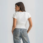 Women’s ribbed short sleeve top made from 95% cotton and 5% lycra. Features a fitted silhouette for a flattering, comfortable fit. Soft and breathable fabric with a versatile design for layering or wearing on its own.