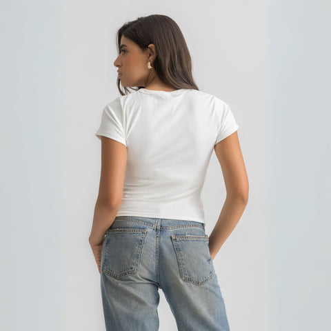 Women’s ribbed short sleeve top made from 95% cotton and 5% lycra. Features a fitted silhouette for a flattering, comfortable fit. Soft and breathable fabric with a versatile design for layering or wearing on its own.