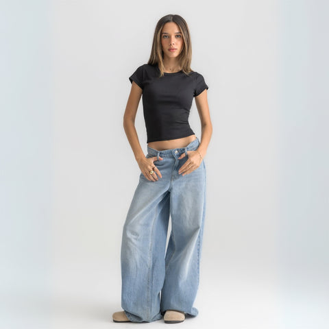 Women’s ribbed short sleeve top made from 95% cotton and 5% lycra. Features a fitted silhouette for a flattering, comfortable fit. Soft and breathable fabric with a versatile design for layering or wearing on its own.