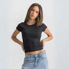 Women’s ribbed short sleeve top made from 95% cotton and 5% lycra. Features a fitted silhouette for a flattering, comfortable fit. Soft and breathable fabric with a versatile design for layering or wearing on its own.