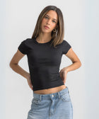 Women’s ribbed short sleeve top made from 95% cotton and 5% lycra. Features a fitted silhouette for a flattering, comfortable fit. Soft and breathable fabric with a versatile design for layering or wearing on its own.
