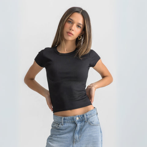 Women’s ribbed short sleeve top made from 95% cotton and 5% lycra. Features a fitted silhouette for a flattering, comfortable fit. Soft and breathable fabric with a versatile design for layering or wearing on its own.