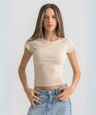 Women’s ribbed short sleeve top made from 95% cotton and 5% lycra. Features a fitted silhouette for a flattering, comfortable fit. Soft and breathable fabric with a versatile design for layering or wearing on its own.