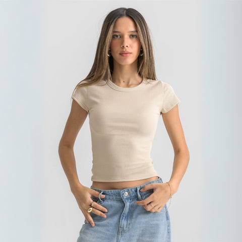 Women’s ribbed short sleeve top made from 95% cotton and 5% lycra. Features a fitted silhouette for a flattering, comfortable fit. Soft and breathable fabric with a versatile design for layering or wearing on its own.