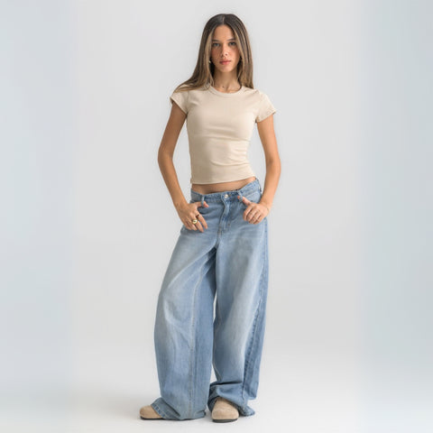 Women’s ribbed short sleeve top made from 95% cotton and 5% lycra. Features a fitted silhouette for a flattering, comfortable fit. Soft and breathable fabric with a versatile design for layering or wearing on its own.