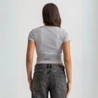 Women’s ribbed short sleeve top made from 95% cotton and 5% lycra. Features a fitted silhouette for a flattering, comfortable fit. Soft and breathable fabric with a versatile design for layering or wearing on its own.