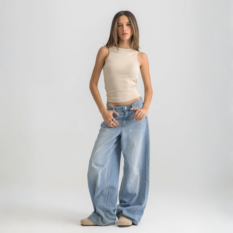 beige ribbed basic tank top for women, front view showcasing fitted silhouette and minimal design.