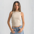 beige ribbed basic tank top for women, front view showcasing fitted silhouette and minimal design.
