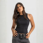 Black ribbed basic tank top for women, front view showcasing fitted silhouette and minimal design.
