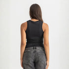Black ribbed basic tank top for women, back view showcasing fitted silhouette and minimal design.