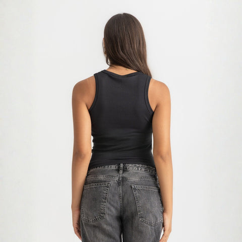 Black ribbed basic tank top for women, back view showcasing fitted silhouette and minimal design.
