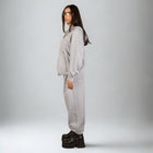 Model wearing the BROWNTOAST Core Full Zip Up Jacket from the Core Drop — a relaxed unisex hoodie with a dual zipper and adjustable hood. Made in Egypt from soft cotton, combining everyday comfort with effortless street style.