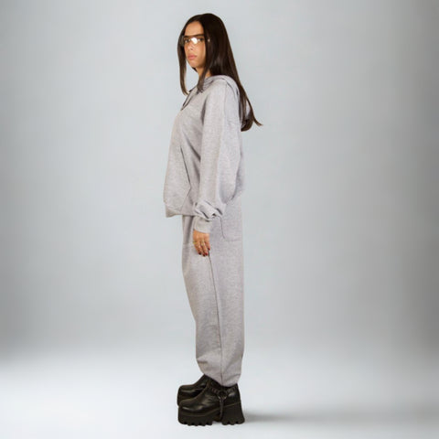 Model wearing the BROWNTOAST Core Full Zip Up Jacket from the Core Drop — a relaxed unisex hoodie with a dual zipper and adjustable hood. Made in Egypt from soft cotton, combining everyday comfort with effortless street style.