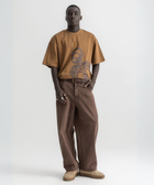 Unisex burnt brown box-fit tee with oversized distressed key graphic on the front